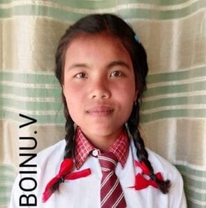 A girl in school uniform with pigtails.