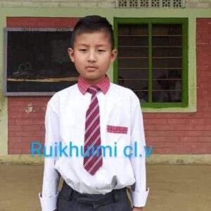 A young boy wearing a tie and white shirt.